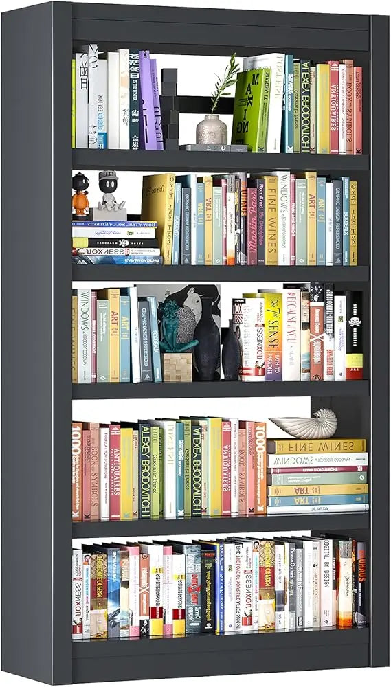 Bookshelf filled with books and decorative items against a black background