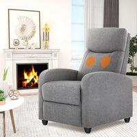 Gray recliner chair with orange circular accents in a living room setting.