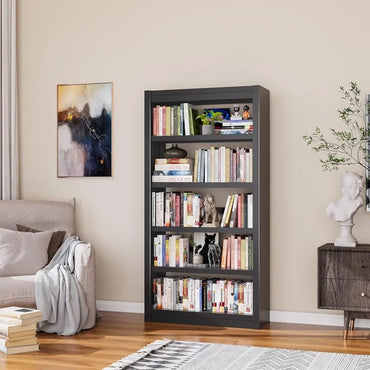 Tall dark bookshelf filled with books and decorative items in a living room setting.